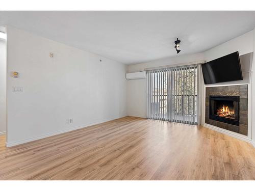 405 32063 Mt Waddington Avenue, Abbotsford, BC - Indoor Photo Showing Living Room With Fireplace