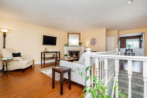 5106 209A Street, Langley, BC - Indoor Photo Showing Other Room With Fireplace