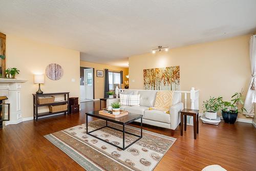 5106 209A Street, Langley, BC - Indoor Photo Showing Living Room With Fireplace