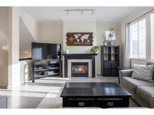 81 14877 58 Avenue, Surrey, BC - Indoor Photo Showing Living Room With Fireplace