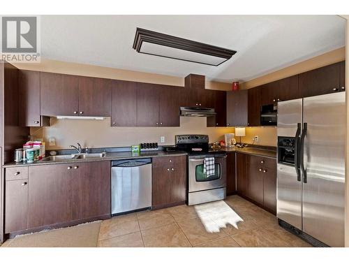 1347 Wilmot Avenue, Kelowna, BC - Indoor Photo Showing Kitchen With Stainless Steel Kitchen With Double Sink