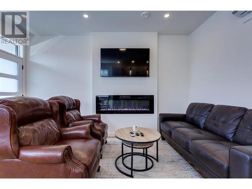 169 Maple Street Unit# 104, Penticton, BC - Indoor Photo Showing Living Room With Fireplace