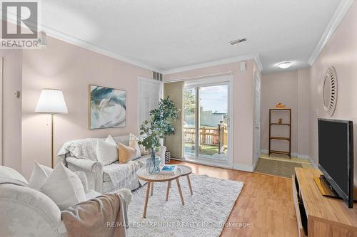 205 - 4140 Foxwood Drive, Burlington, ON - Indoor Photo Showing Living Room