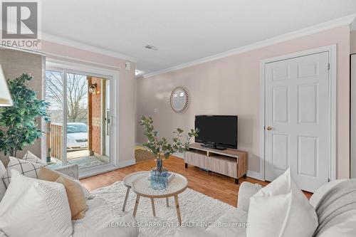 205 - 4140 Foxwood Drive, Burlington, ON - Indoor Photo Showing Living Room