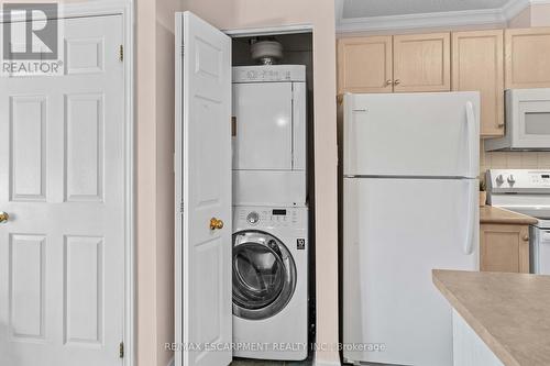 205 - 4140 Foxwood Drive, Burlington, ON - Indoor Photo Showing Laundry Room