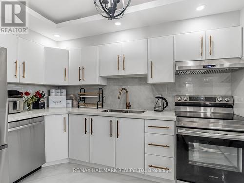 1206 - 2550 Pharmacy Avenue, Toronto, ON - Indoor Photo Showing Kitchen With Double Sink With Upgraded Kitchen