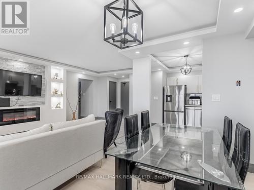 1206 - 2550 Pharmacy Avenue, Toronto, ON - Indoor With Fireplace