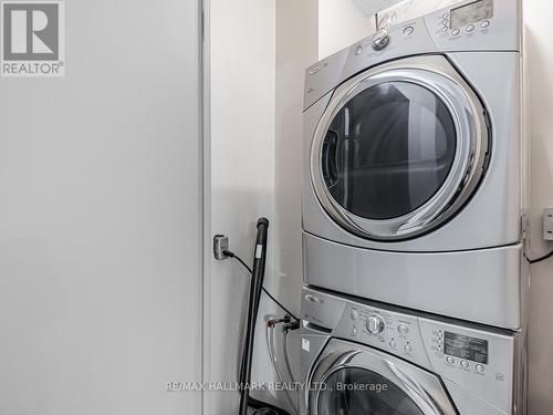 1206 - 2550 Pharmacy Avenue, Toronto, ON - Indoor Photo Showing Laundry Room