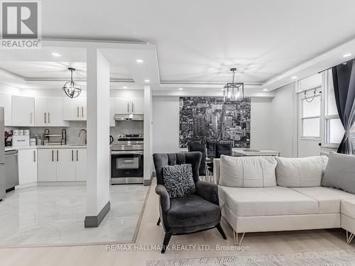 1206 - 2550 Pharmacy Avenue, Toronto, ON - Indoor Photo Showing Living Room