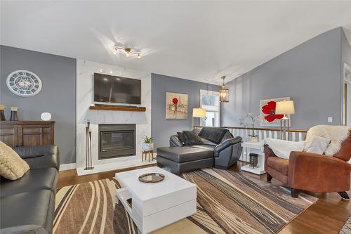 10412 Sherman Drive, Lake Country, BC - Indoor Photo Showing Living Room With Fireplace