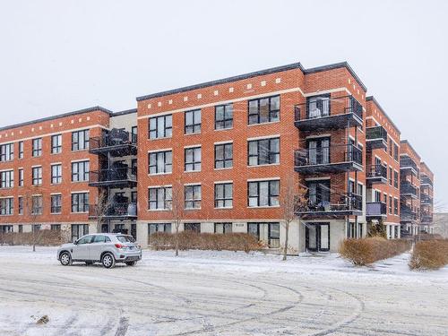 Frontage - 412-2555 Rue Grenet, Montréal (Saint-Laurent), QC - Outdoor With Balcony With Facade