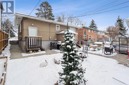 Rear yard showing walkway to front of home - 1511 Child Avenue Ne, Calgary, AB - Outdoor