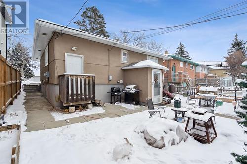 Rear yard showing entries to main floor and lower suites - 1511 Child Avenue Ne, Calgary, AB - Outdoor