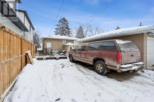 2 Parking spaces behind home off rear alley in addition to double detached garage - 1511 Child Avenue Ne, Calgary, AB - Outdoor With Exterior