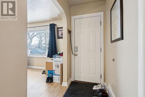 Main floor: front entry - 1511 Child Avenue Ne, Calgary, AB - Indoor Photo Showing Other Room