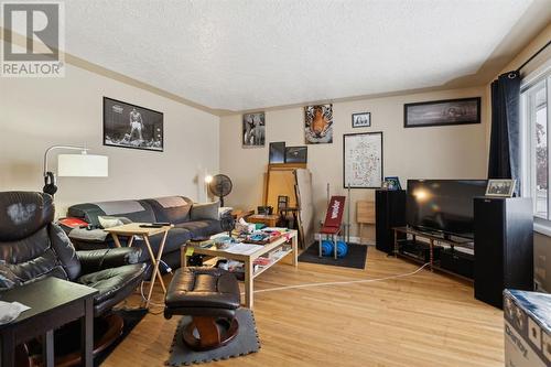 Main floor: living room with hardwood floor - 1511 Child Avenue Ne, Calgary, AB - Indoor