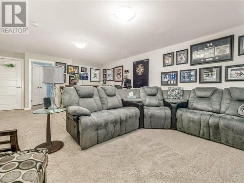 Lower family room - 39 Moonlight Boulevard W, Lethbridge, AB - Indoor Photo Showing Living Room