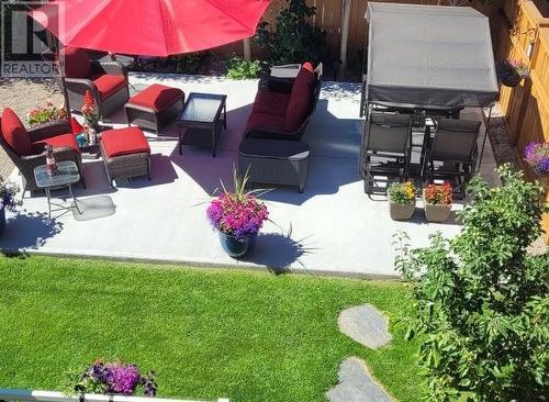 Rear patio - summer - 39 Moonlight Boulevard W, Lethbridge, AB - Outdoor With Deck Patio Veranda