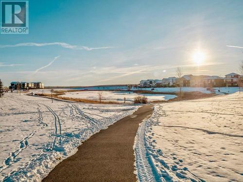 Lake/Pond path - 39 Moonlight Boulevard W, Lethbridge, AB - Outdoor With Body Of Water With View