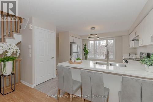 103 - 1 Beckenrose Court, Brampton, ON - Indoor Photo Showing Kitchen With Double Sink