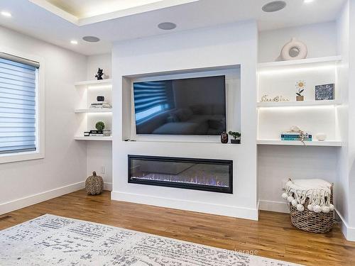 30 Heatherglen Rd, Toronto, ON - Indoor Photo Showing Living Room With Fireplace