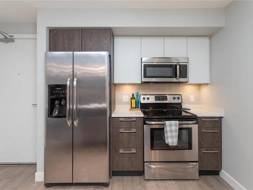 103-1000 Inverness Rd, Saanich, BC - Indoor Photo Showing Kitchen With Stainless Steel Kitchen