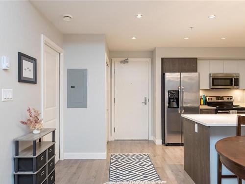 103-1000 Inverness Rd, Saanich, BC - Indoor Photo Showing Kitchen With Stainless Steel Kitchen