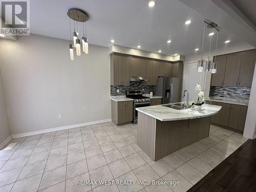 Upper - 151 Robert Parkinson Drive, Brampton, ON - Indoor Photo Showing Kitchen With Double Sink With Upgraded Kitchen