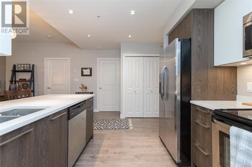 103 1000 Inverness Rd, Saanich, BC - Indoor Photo Showing Kitchen With Double Sink