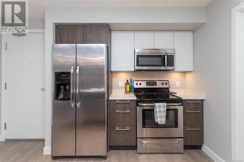 103 1000 Inverness Rd, Saanich, BC - Indoor Photo Showing Kitchen With Stainless Steel Kitchen