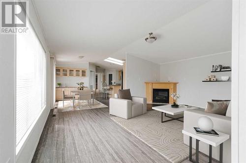 124 Fir Street, Fort Mcmurray, AB - Indoor Photo Showing Living Room With Fireplace