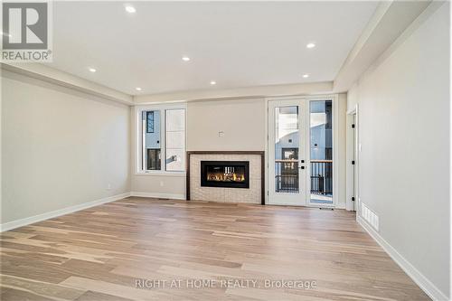 583 Codd'S Road N, Ottawa, ON - Indoor Photo Showing Living Room With Fireplace