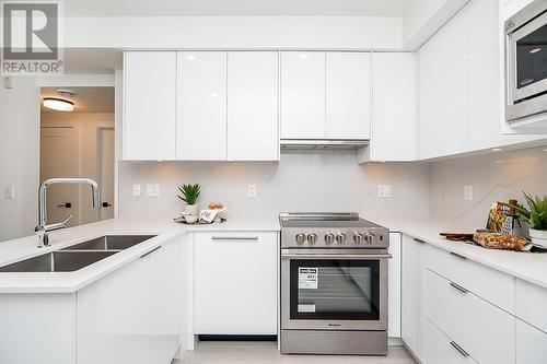 406 5399 Joyce Street, Vancouver, BC - Indoor Photo Showing Kitchen With Stainless Steel Kitchen With Double Sink With Upgraded Kitchen