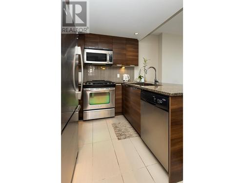 2606 2968 Glen Drive, Coquitlam, BC - Indoor Photo Showing Kitchen With Stainless Steel Kitchen