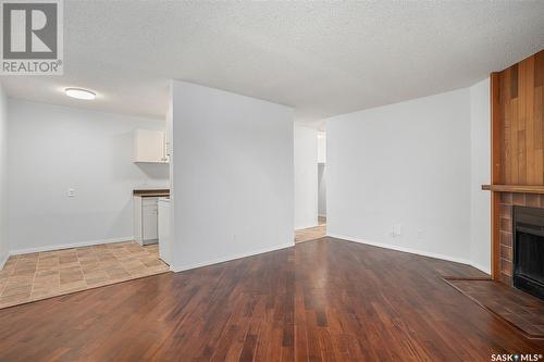 303 855 Wollaston Crescent, Saskatoon, SK - Indoor With Fireplace