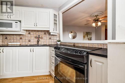 918 - 2020 Jasmine Crescent, Ottawa, ON - Indoor Photo Showing Kitchen With Double Sink