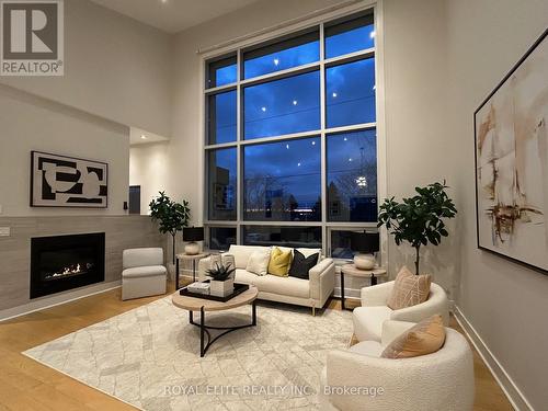 41 Valentine Drive, Toronto, ON - Indoor Photo Showing Living Room With Fireplace