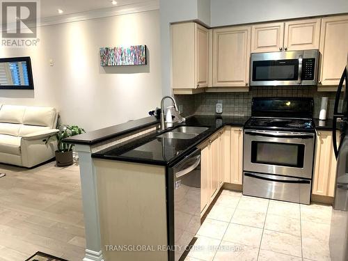 107 - 3840 Bathurst Street W, Toronto, ON - Indoor Photo Showing Kitchen With Double Sink