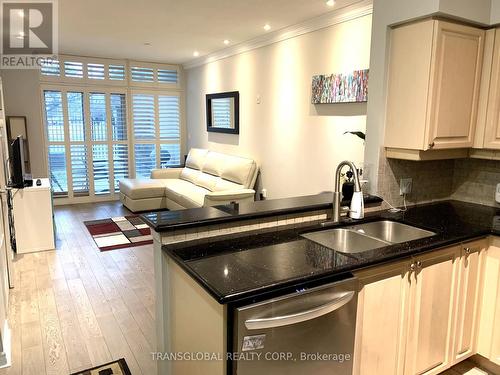 107 - 3840 Bathurst Street W, Toronto, ON - Indoor Photo Showing Kitchen With Double Sink