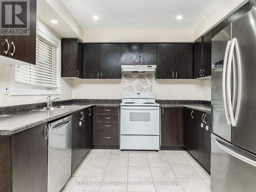 09 - 200 Veterans Drive, Brampton, ON - Indoor Photo Showing Kitchen With Double Sink