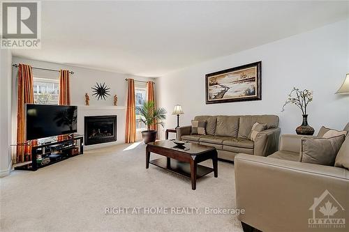 849 Clearbrook Drive, Ottawa, ON - Indoor Photo Showing Living Room With Fireplace