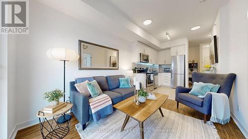 612 - 840 Queen'S Plate Drive, Toronto, ON - Indoor Photo Showing Living Room