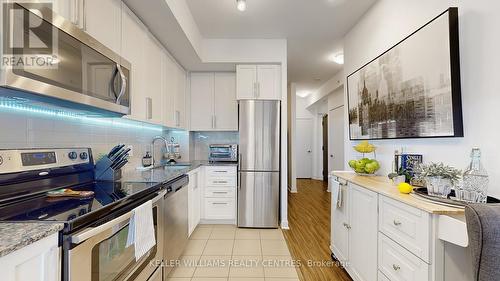 612 - 840 Queen'S Plate Drive, Toronto, ON - Indoor Photo Showing Kitchen With Stainless Steel Kitchen With Upgraded Kitchen