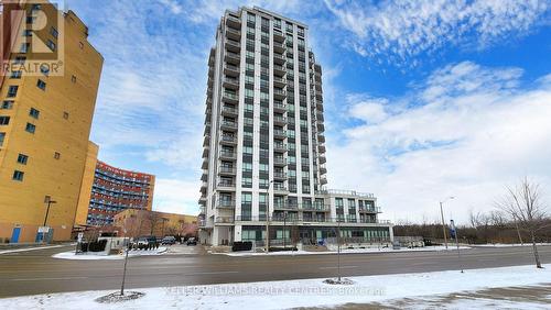 612 - 840 Queen'S Plate Drive, Toronto, ON - Outdoor With Balcony With Facade