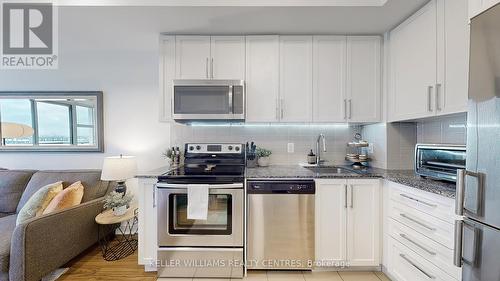 612 - 840 Queen'S Plate Drive, Toronto, ON - Indoor Photo Showing Kitchen With Stainless Steel Kitchen With Upgraded Kitchen