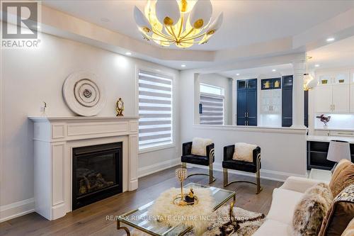 18 Elverton Crescent, Brampton, ON - Indoor Photo Showing Living Room With Fireplace