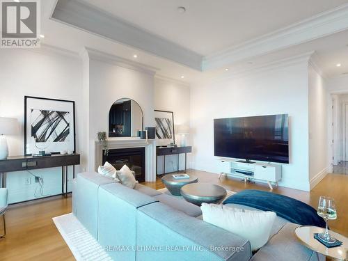 5104 - 311 Bay Street, Toronto, ON - Indoor Photo Showing Living Room With Fireplace