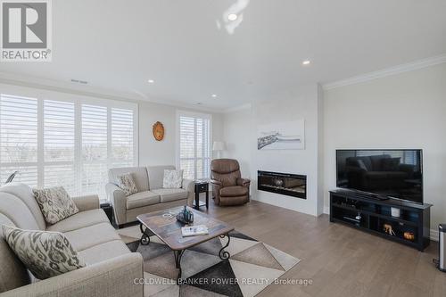 404 - 460 Callaway Road, London, ON - Indoor Photo Showing Living Room With Fireplace