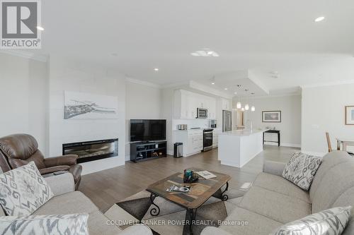 404 - 460 Callaway Road, London, ON - Indoor Photo Showing Living Room With Fireplace