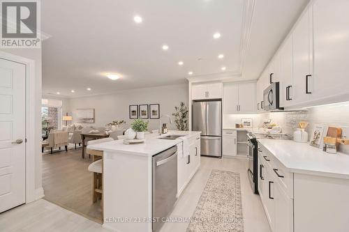 309 - 1560 Upper West Avenue, London, ON - Indoor Photo Showing Kitchen With Stainless Steel Kitchen With Upgraded Kitchen